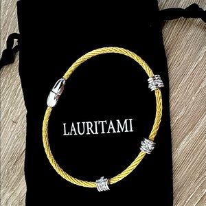 New never worn Italian Lauritami gold steel bracelet.